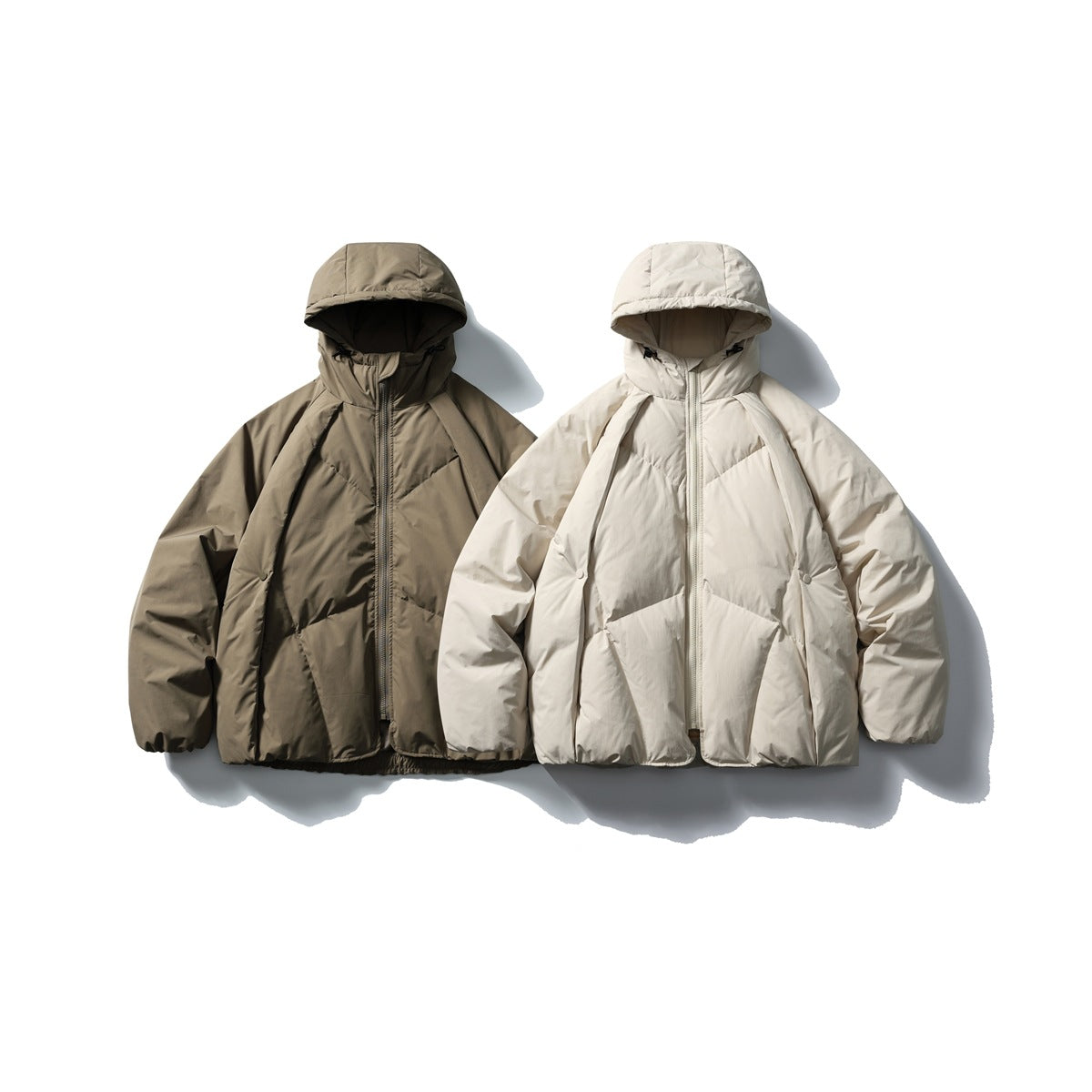Two hooded jackets shown from the front: one olive-brown and one light beige, both with front zippers.