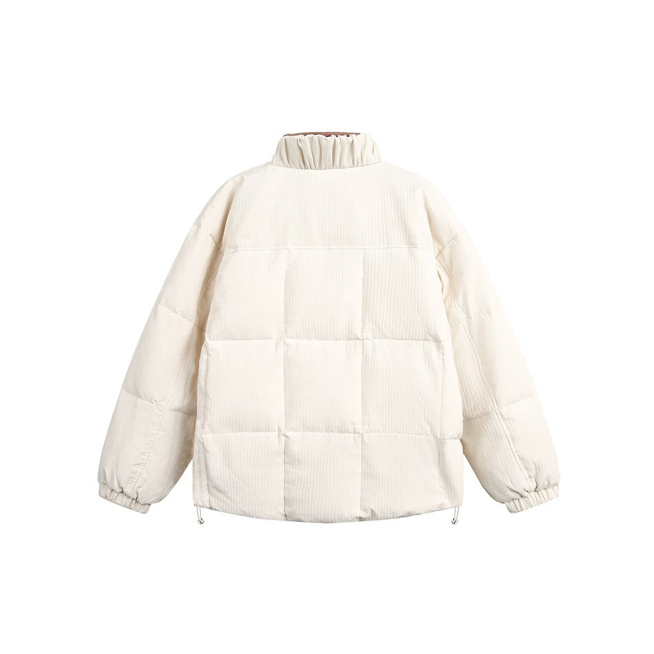 Back view of an ivory quilted puffer jacket with a stand collar and elastic cuffs.