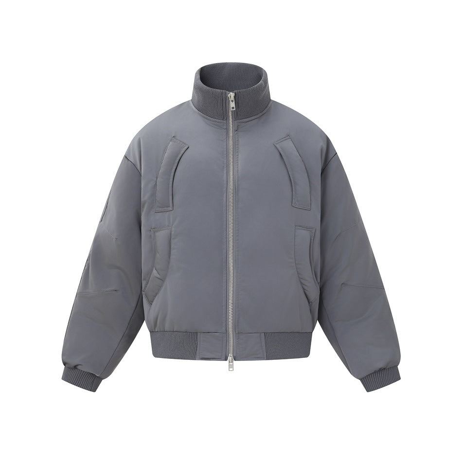 Dark gray padded bomber-style jacket with ribbed stand collar, silver front zip and curved panel details, front view