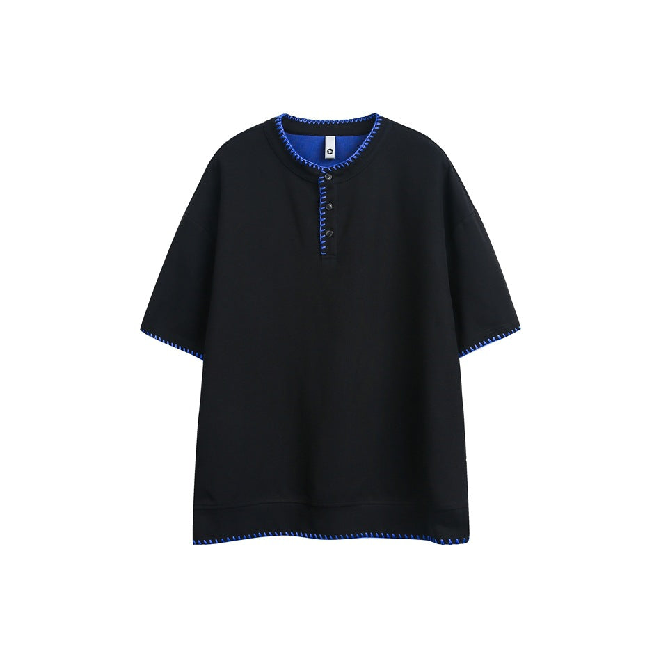 Black short-sleeve Henley top with blue contrast whipstitch trim at neckline, placket, sleeves and hem