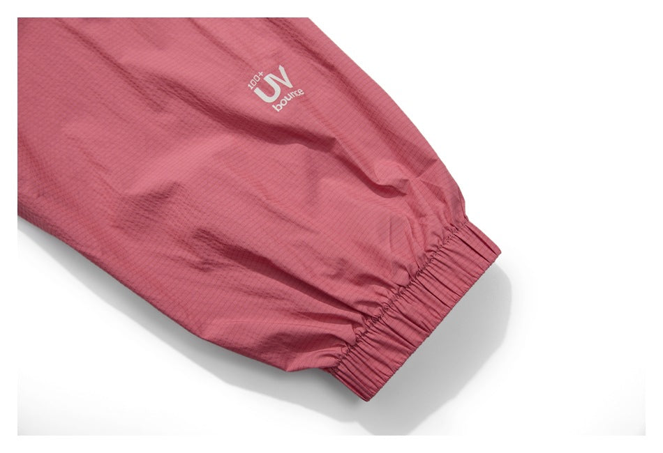 Dusty rose sleeve ending in an elastic cuff, with a small white UV print on the fabric.