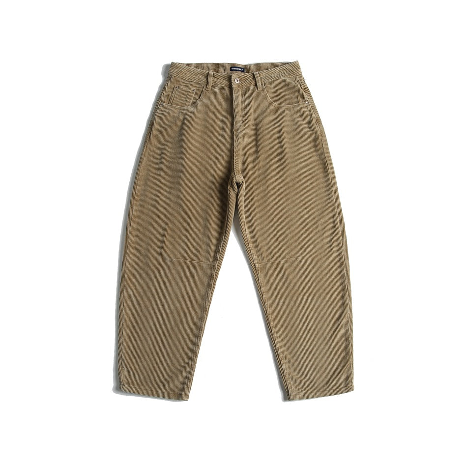 Khaki wide-rib corduroy pants laid flat, front view, with a relaxed tapered leg and knee seams