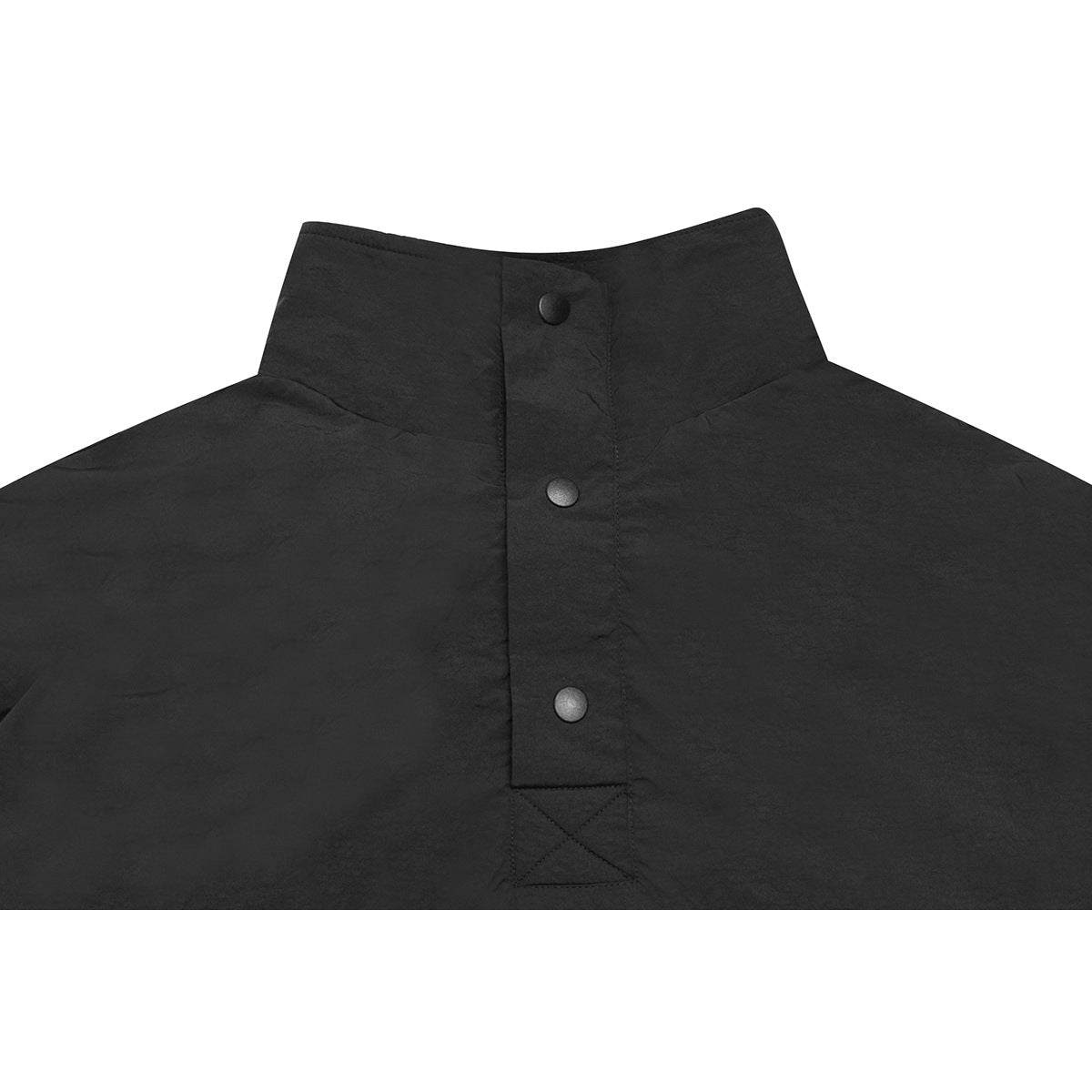 Close-up of a black garment's stand collar and front placket with three snap buttons.