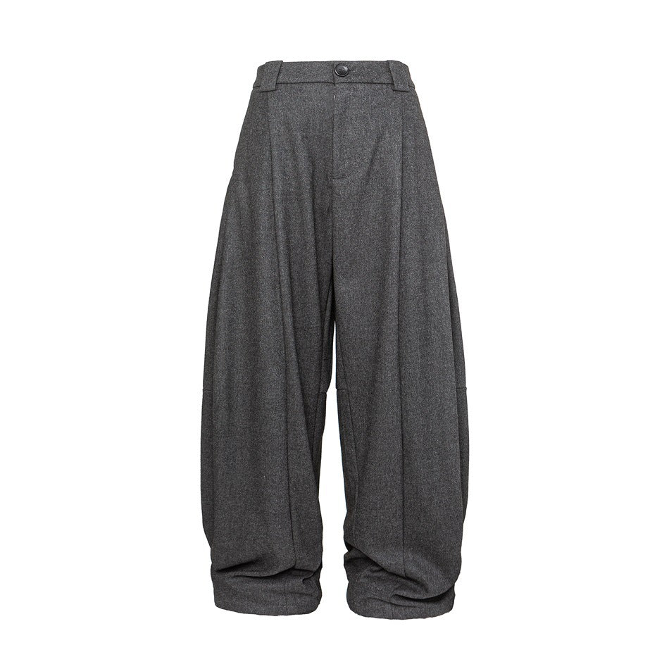 Front view of charcoal gray wide-leg trousers with a buttoned waistband, belt loops, and full-length legs.