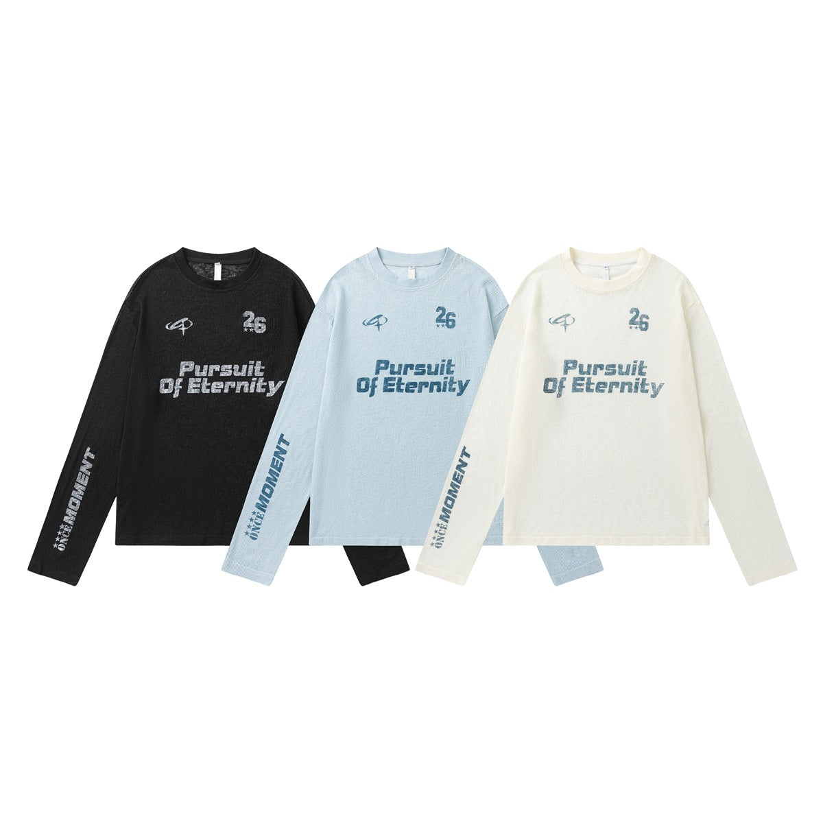 Three long-sleeve crewneck shirts in black, pale blue, and ivory, each with graphic text on the front and sleeve.
