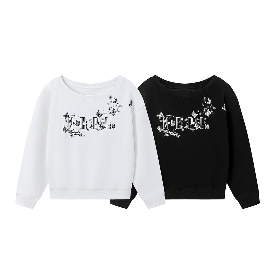 White and black crewneck sweatshirts with long sleeves and butterfly-and-star chest graphics, shown from the front.