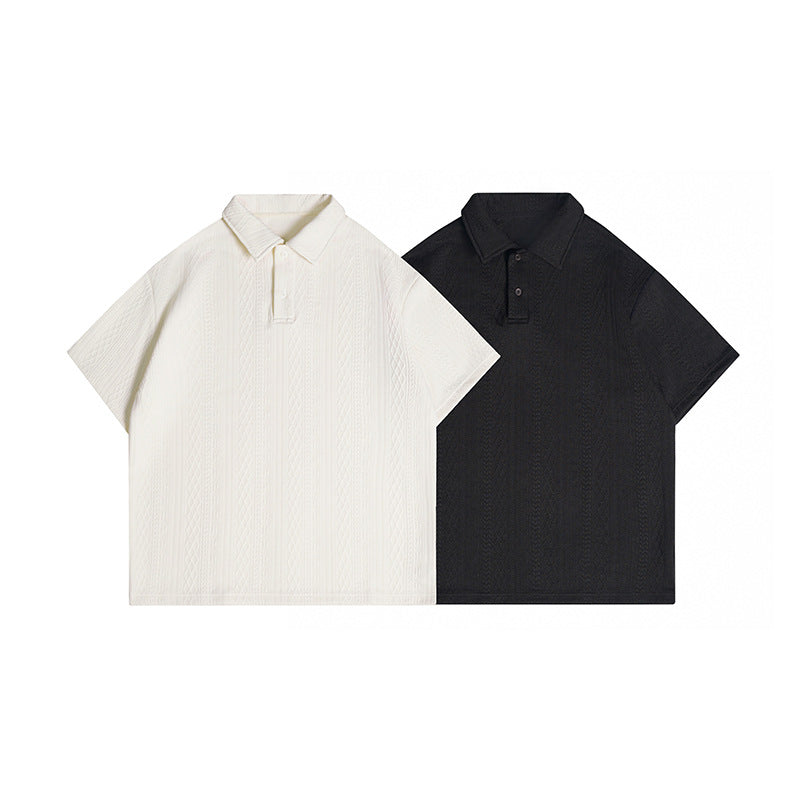 White and black short-sleeve polo shirts shown side by side from the front.