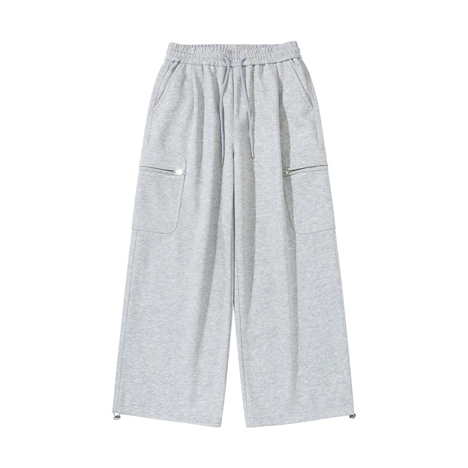 Light heather gray wide-leg sweatpants flat lay, front view with drawstring waist and zippered side cargo pockets