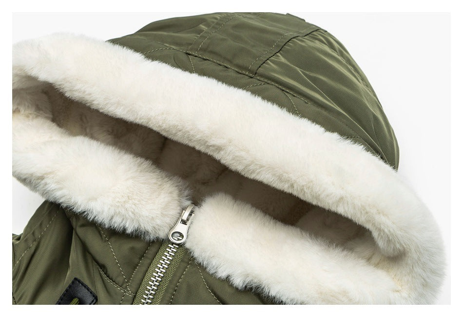 Close-up of the olive parka's hood, lined and trimmed with thick white faux fur.