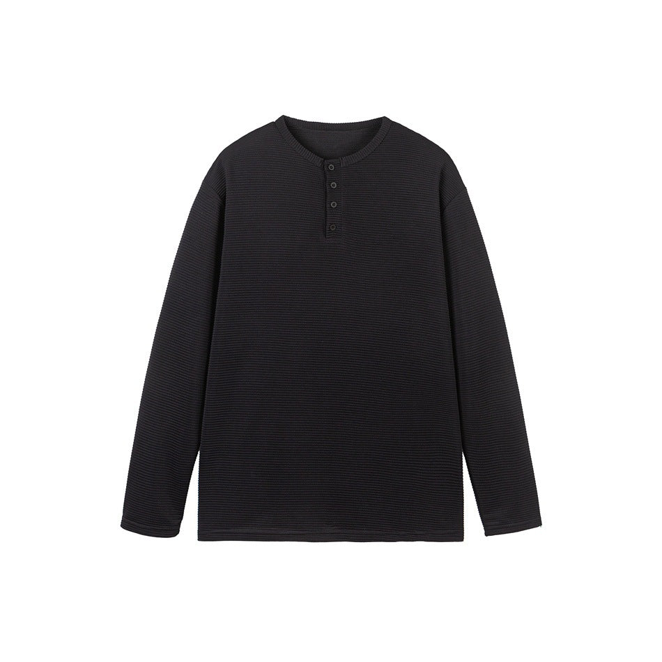 Front view of a black long-sleeve henley shirt with a ribbed texture and four-button placket, shown flat.