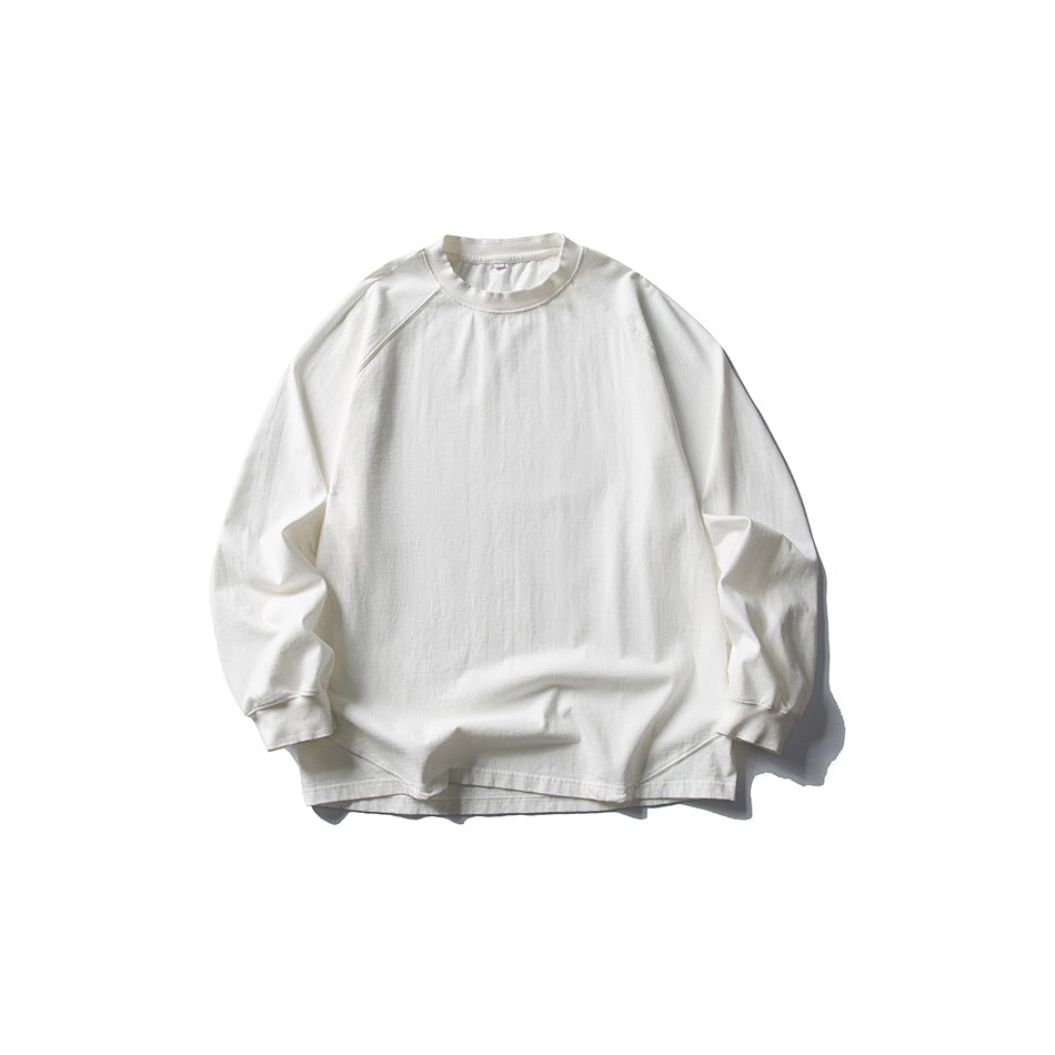 White long-sleeve raglan crew-neck T-shirt flat lay, front view
