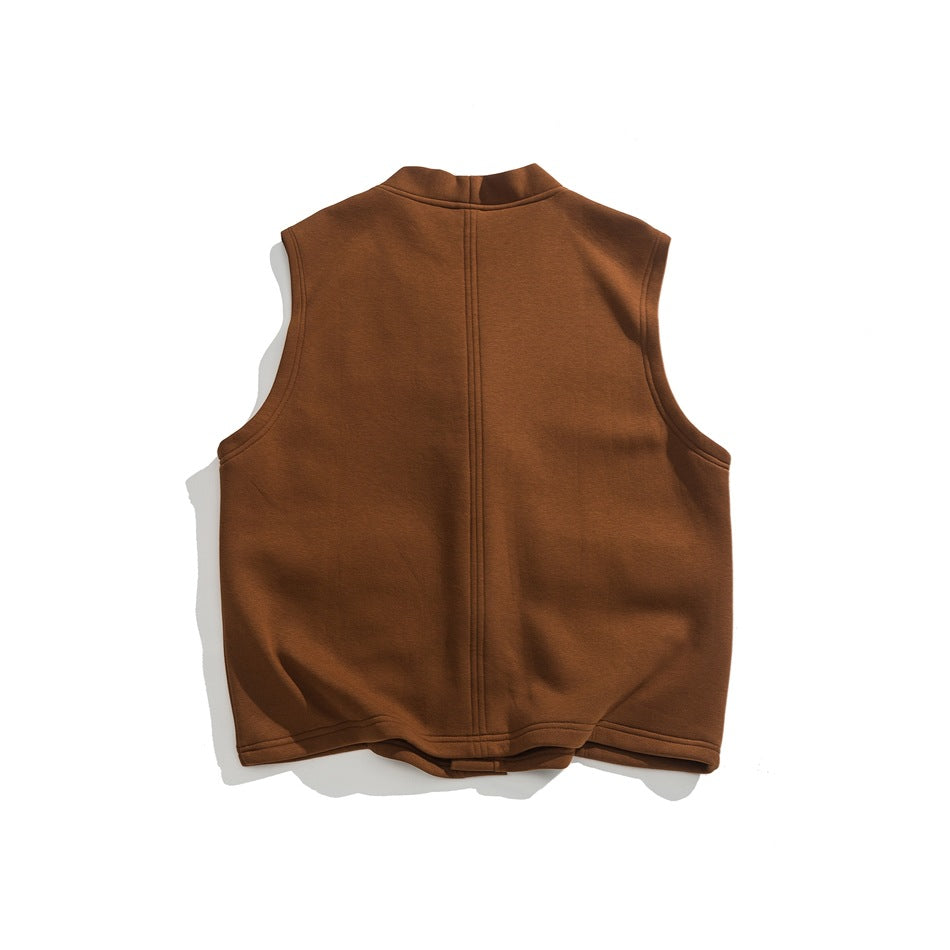 Back view of a rust-brown sleeveless vest laid flat, with a raised collar and a center seam.
