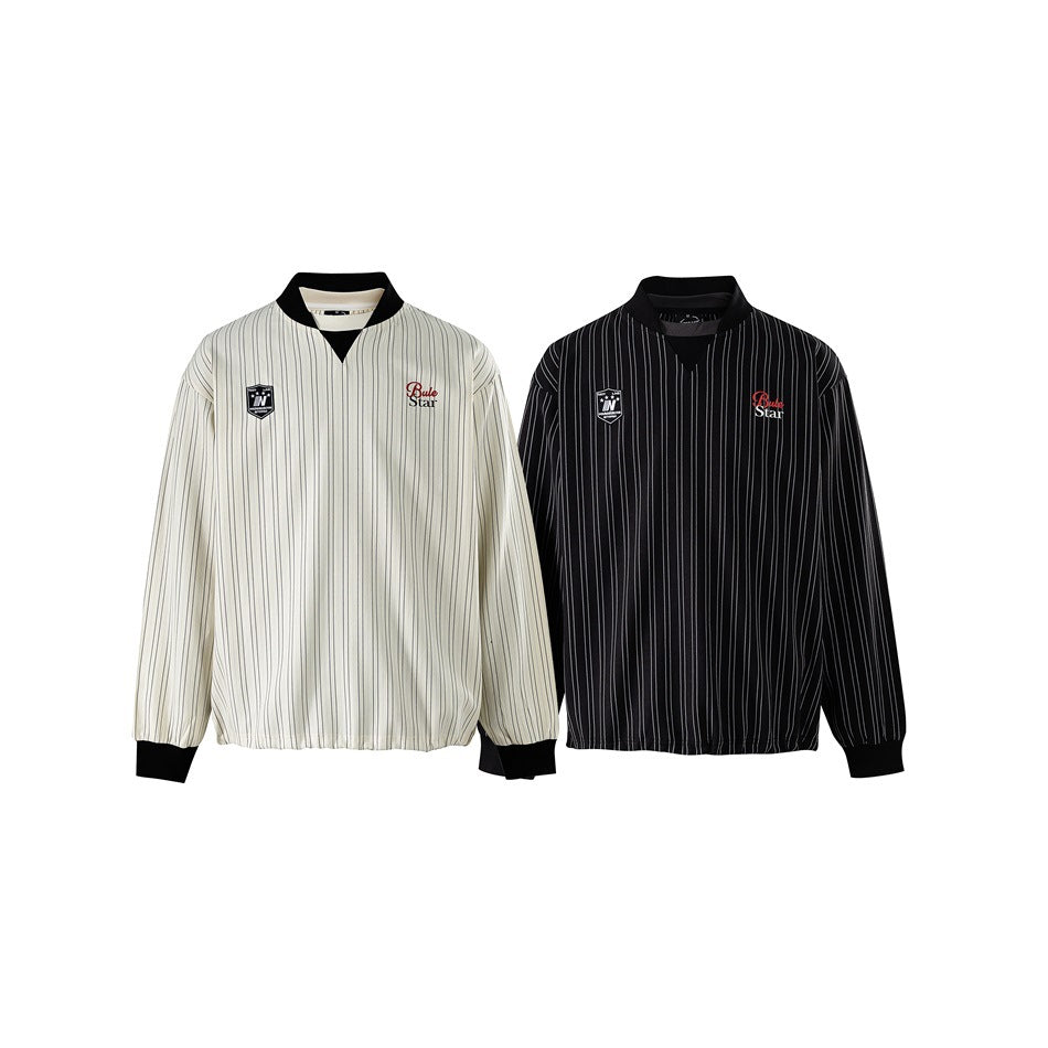 Two long-sleeved pinstriped jackets shown from the front, one cream with black trim and one black with light stripes.
