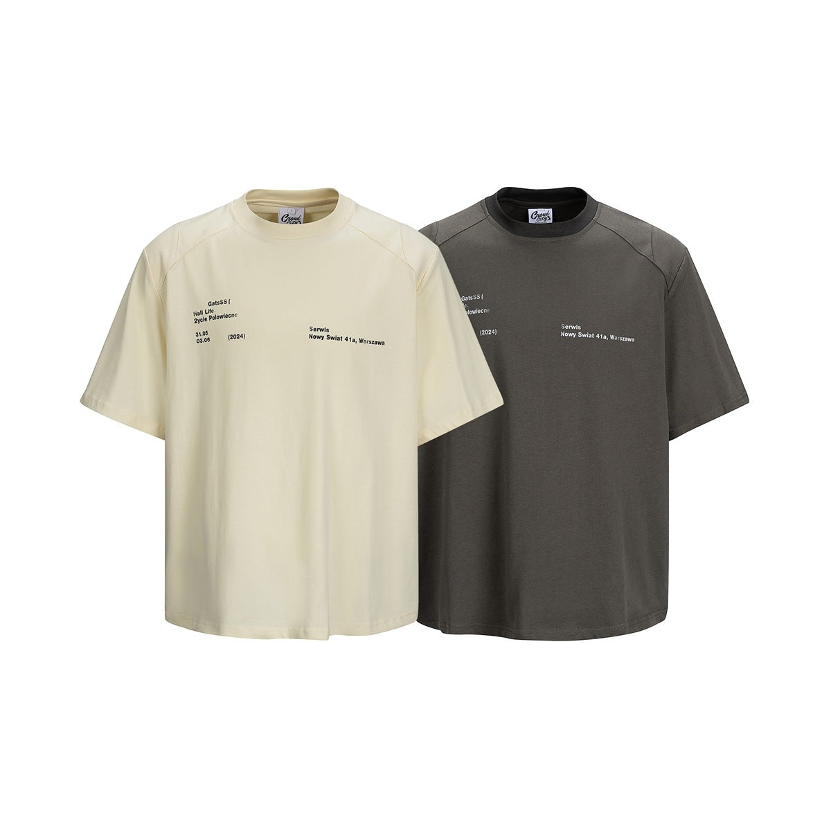 Cream and charcoal short-sleeve crewneck T-shirts shown from the front, each with small chest text.