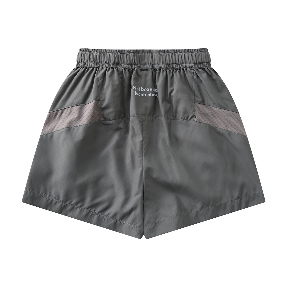 Back view of charcoal gray shorts with an elastic waistband and contrasting dotted side panels.
