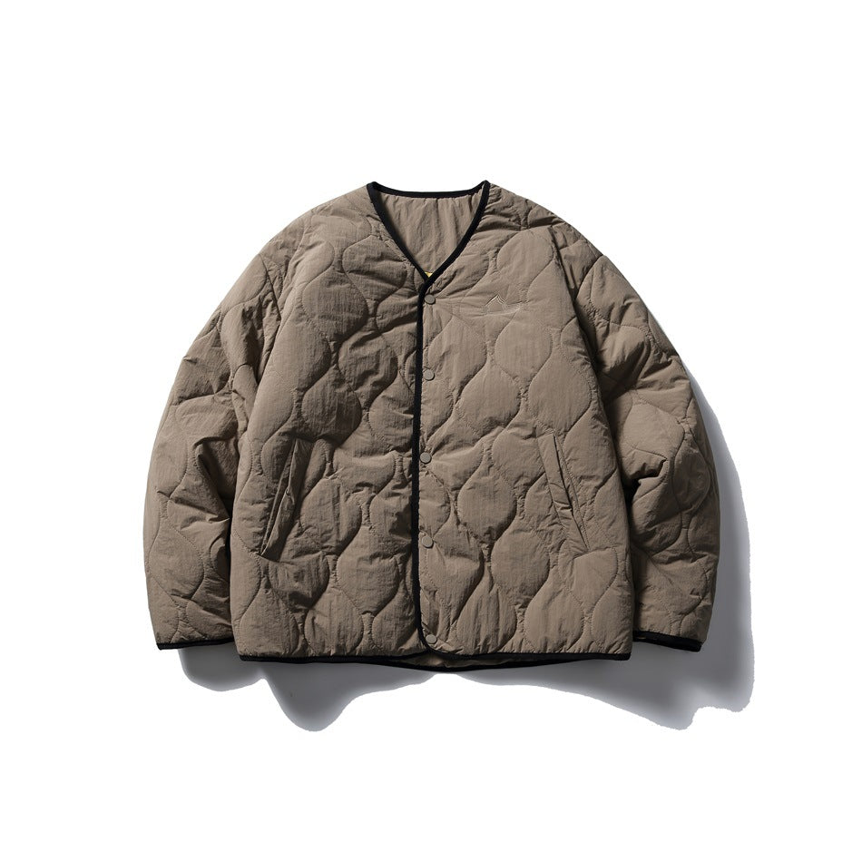 Brown quilted V-neck snap-front jacket with black edge trim, flat front view