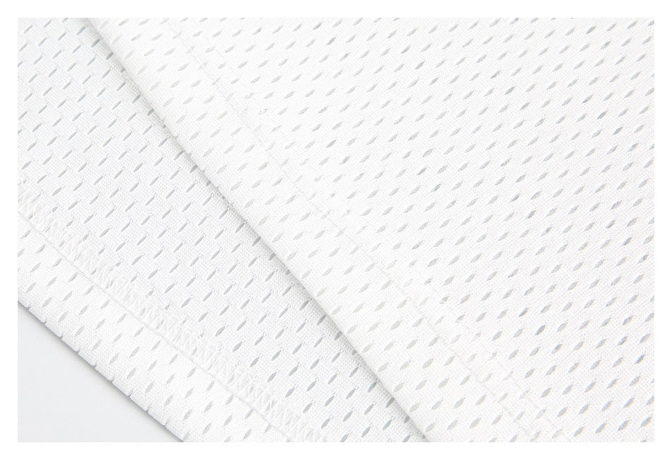 Close-up showing the white garment's perforated mesh texture and stitched seam.