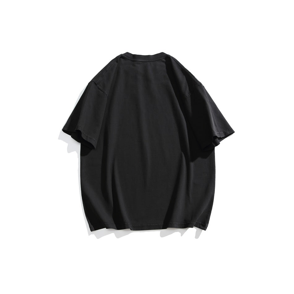 Back view of a plain oversized black T-shirt with short sleeves.