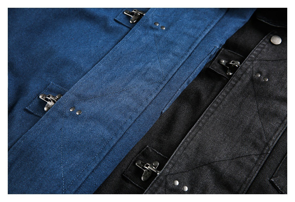 Close-up of blue and black jacket fronts with metal clasp fasteners and small rivets.