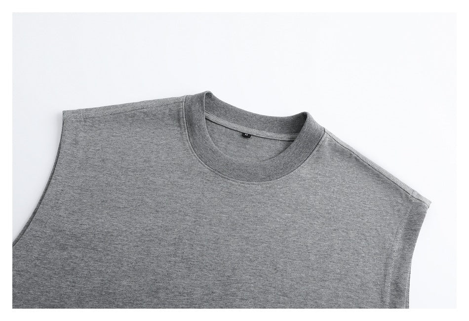 Upper front of a heather gray sleeveless crew-neck top laid flat on a white background.