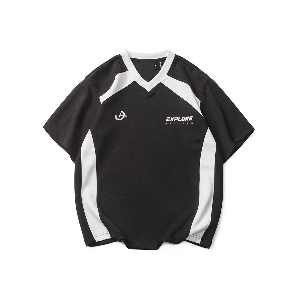 Black short-sleeve V-neck tee with white side panels, white ribbed collar and white EXPLORE FREEDOM chest print