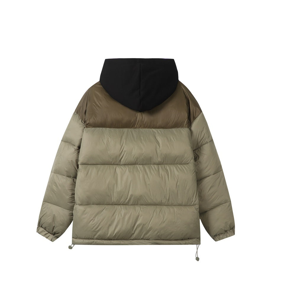 Back of a taupe and light-khaki color-block puffer jacket with a black hood, shown flat.