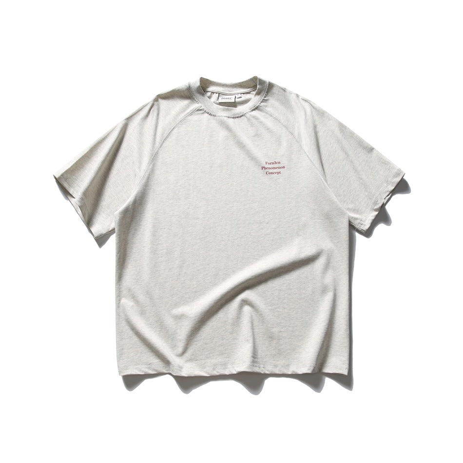 Off-white short-sleeve raglan T-shirt shown flat from the front, with small burgundy English text on the chest.