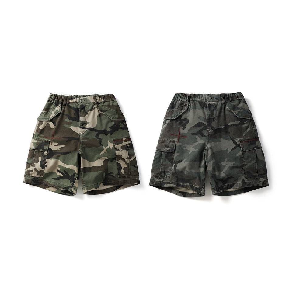 Two camouflage cargo shorts colorways shown side by side, with the front of one and back of the other visible.