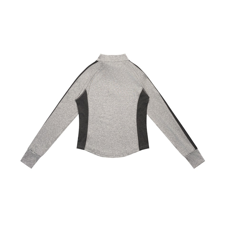 Back view of a heather-gray long-sleeve top with charcoal side panels and sleeve accents.