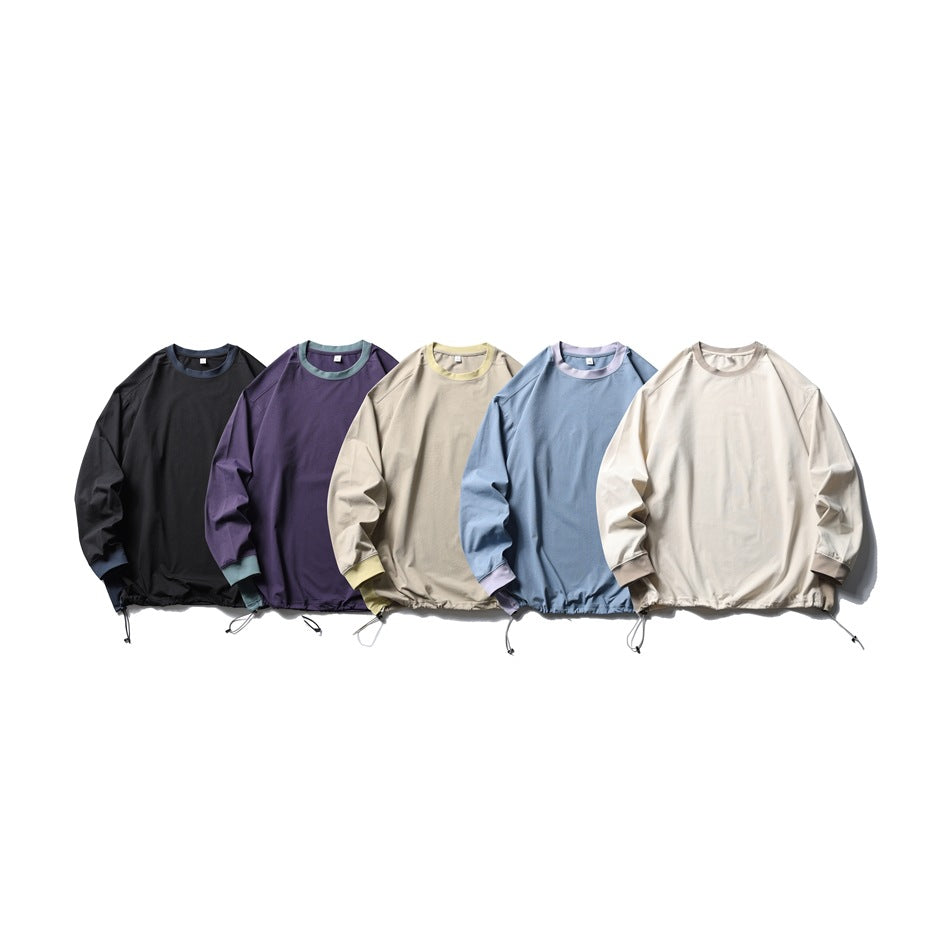 Five long-sleeve pullover tops with drawcord hems in black, purple, beige, blue, and off-white.