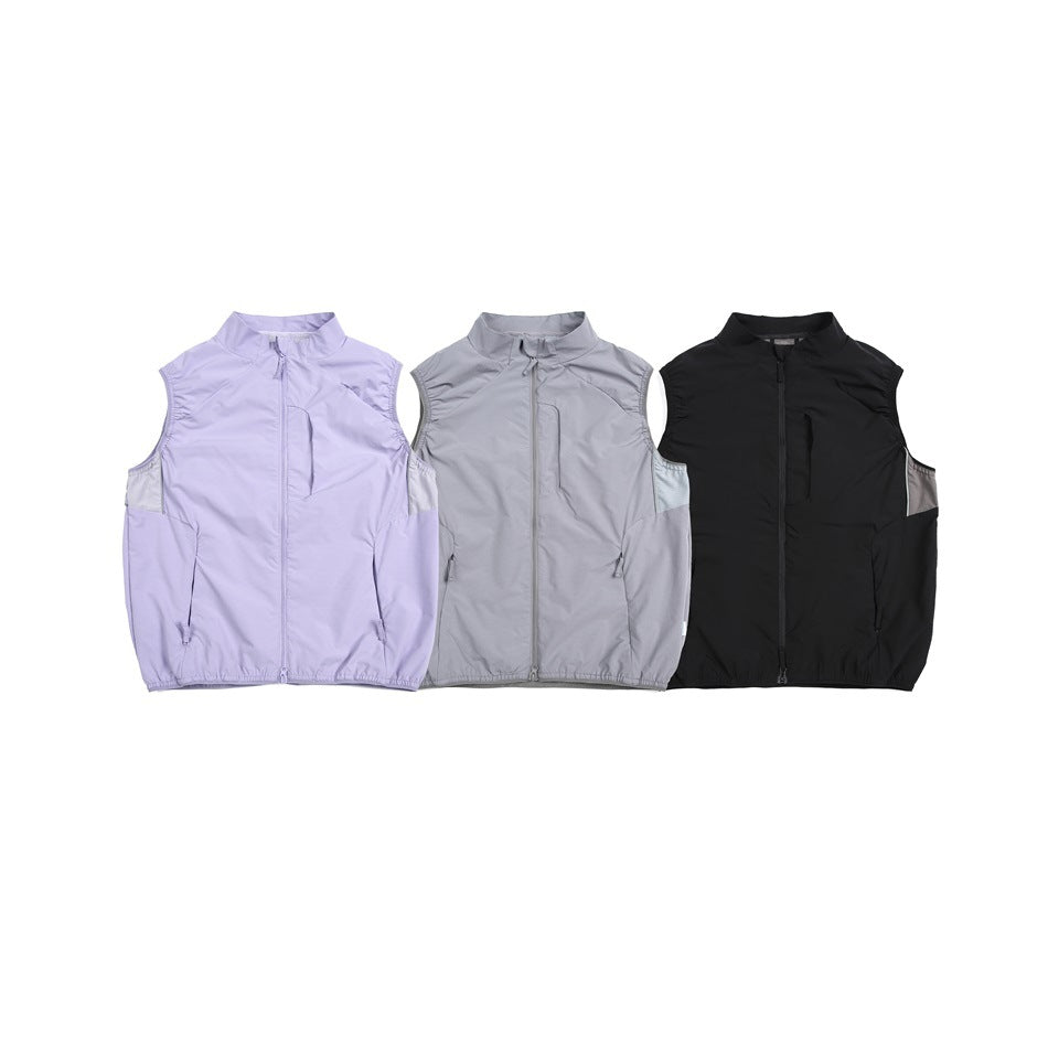 Three sleeveless zip vests shown from the front in lavender, light gray, and black.