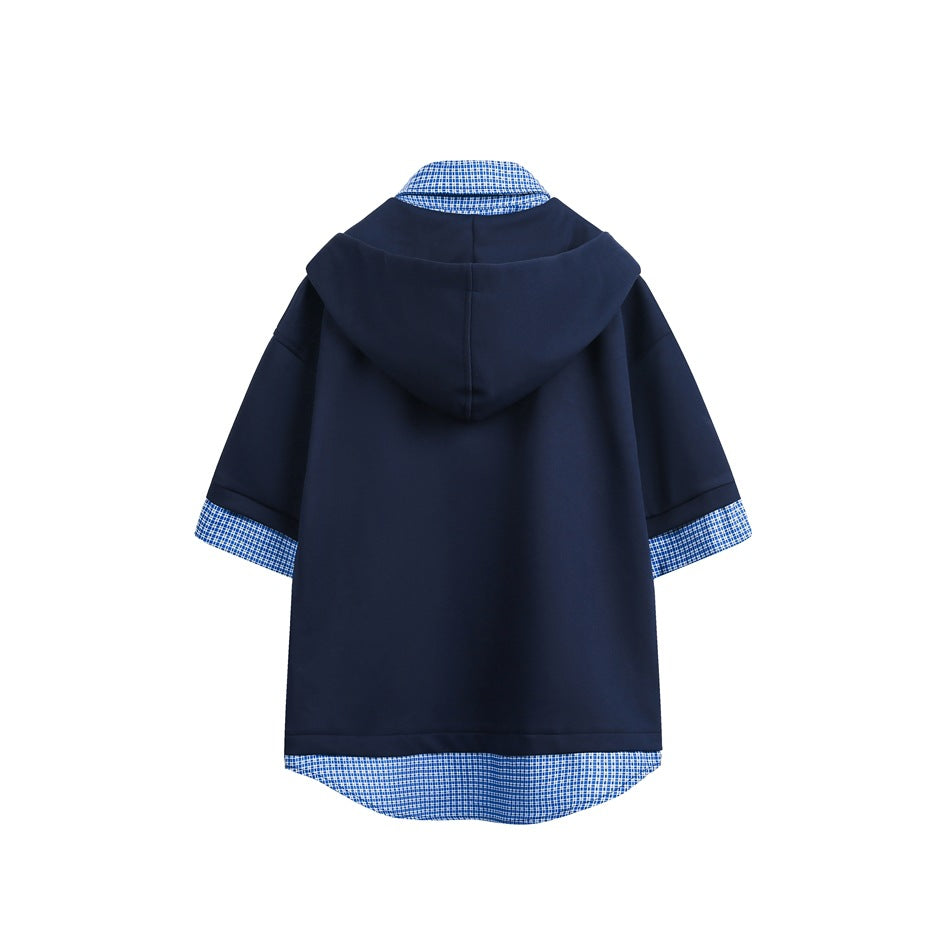 Back view of a navy short-sleeve hooded top with blue checked fabric at the collar, cuffs, and curved hem.