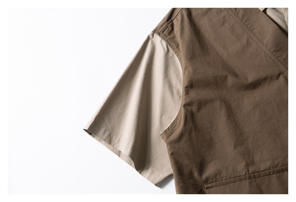 Close-up of a light beige short sleeve beneath a dark brown sleeveless garment, showing the armhole and stitching.