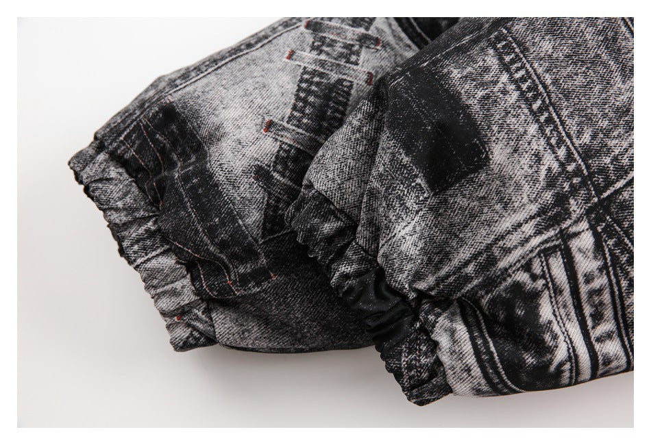 Close-up of gathered elastic edging and seams on the black-and-gray patterned jacket.