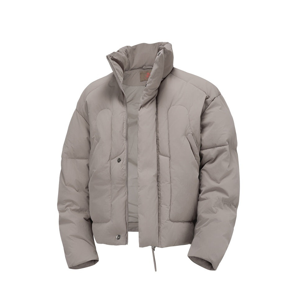 Mocha taupe puffer jacket with stand collar, partly unzipped, showing quilted panels and snap details