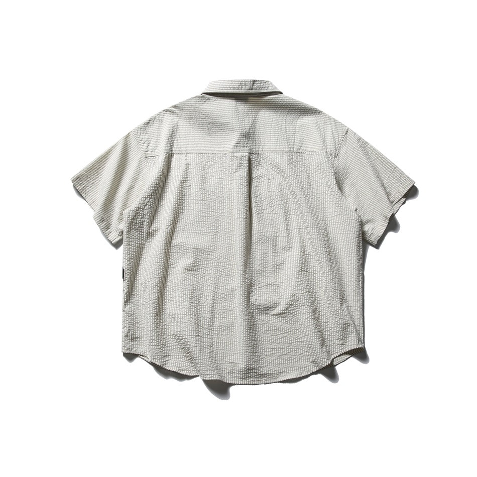 Back view of a light gray short-sleeve shirt with fine dark stripes and a center back pleat.