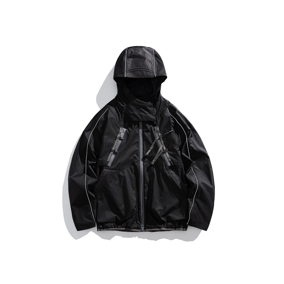 Black hooded zip jacket with gray chest straps, reflective-looking piping and large front pockets, flat lay