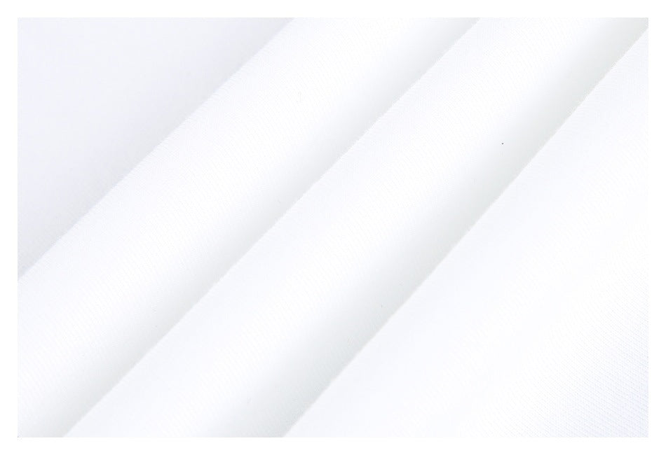 Close-up of white fabric arranged in soft diagonal folds.