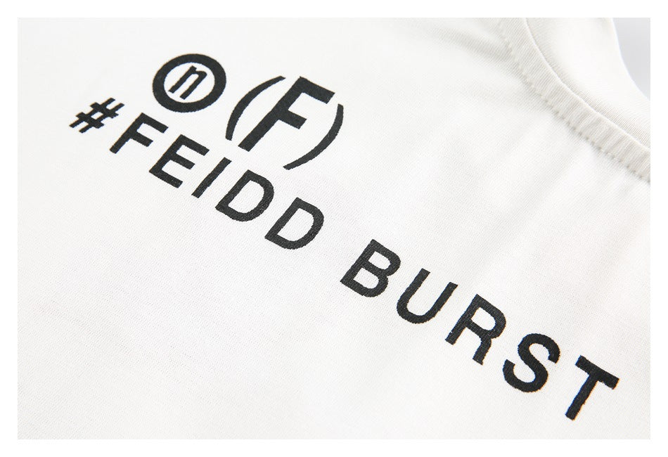 Close-up of white fabric with black printed symbols and the text “#FEIDD BURST.”