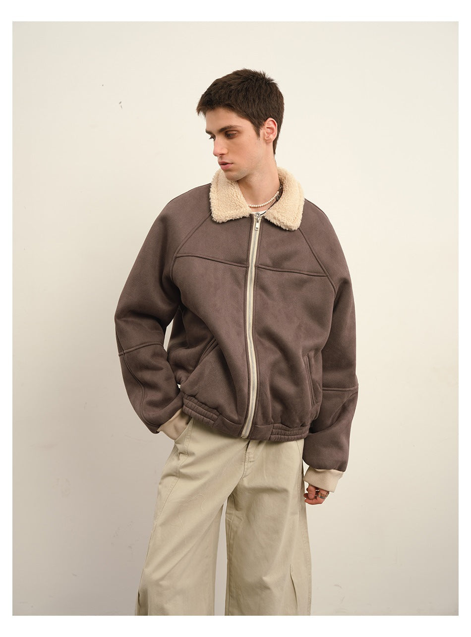 Model wearing a dark taupe jacket with a cream sherpa collar and cuffs, shown at a three-quarter angle.