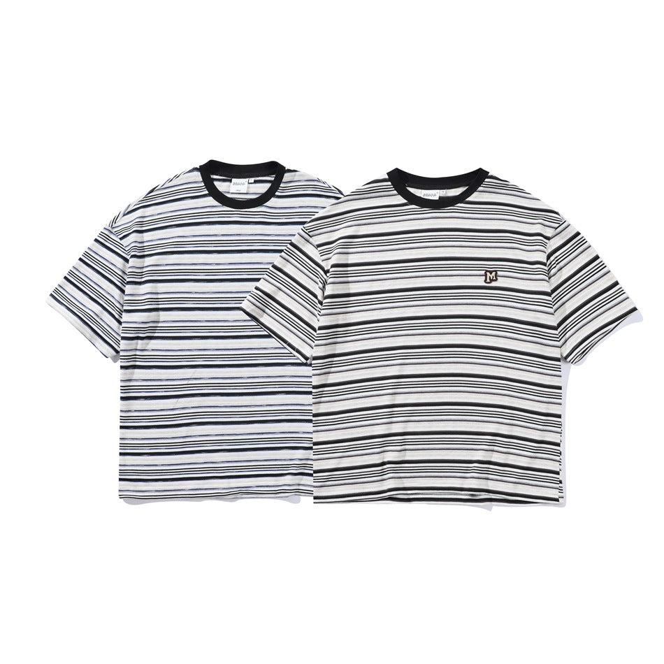 Two short-sleeve striped T-shirts shown from the front, one with navy accents and one with black accents; both have black