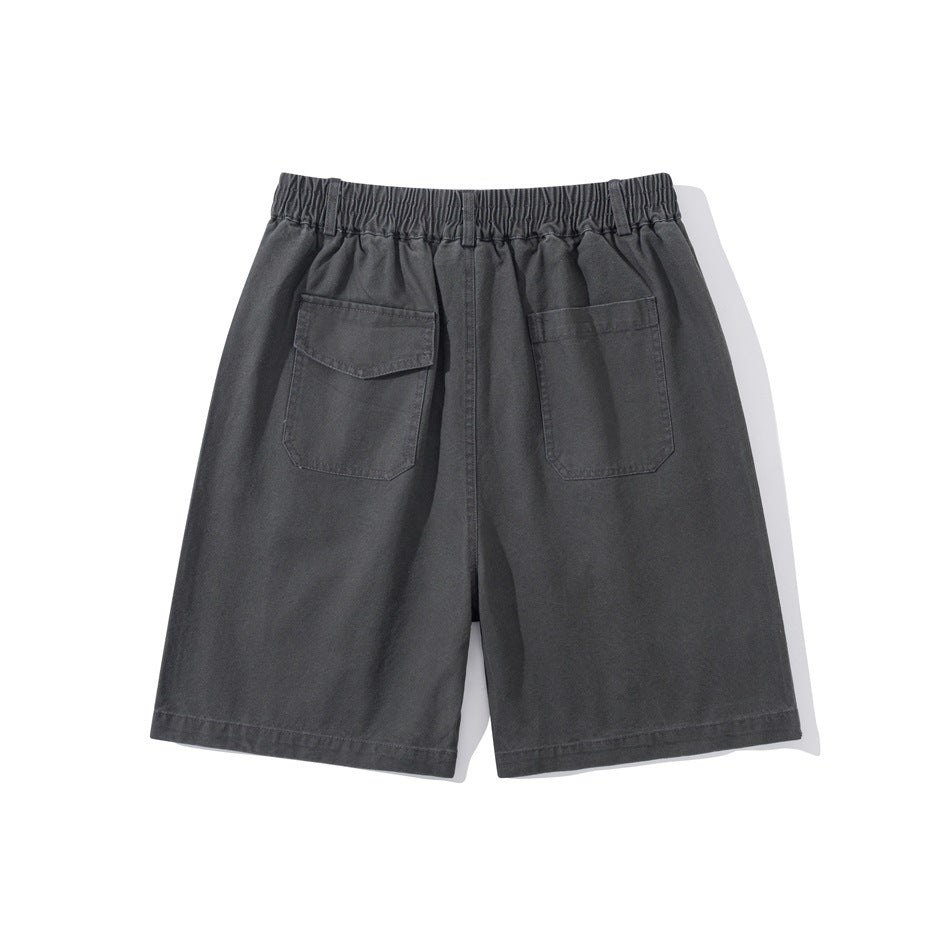 Charcoal gray shorts shown from the back, with an elastic waistband and two rear pockets.