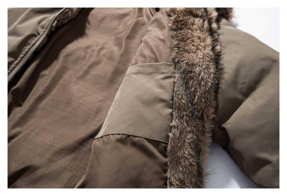 Close-up of the taupe jacket's inner lining, patch pocket, and brown faux-fur trim.