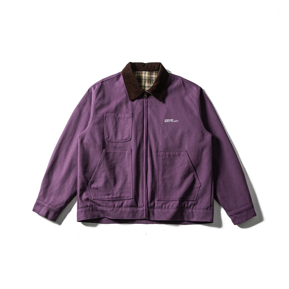 Purple zip-front work jacket with brown collar, plaid collar underside and three patch pockets, flat lay