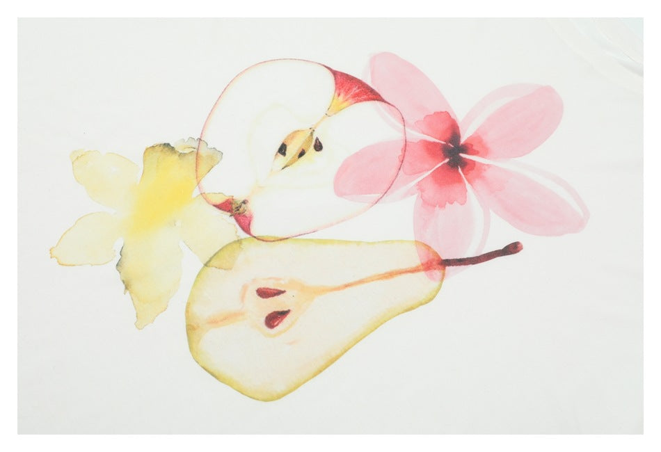Watercolor-style fruit and flower print in pink, yellow, and red on white T-shirt fabric.