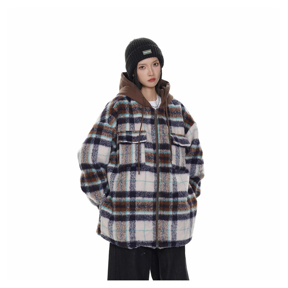 Front view of a person wearing a white multicolor plaid zip-front hooded jacket with flap pockets, black pants and a black