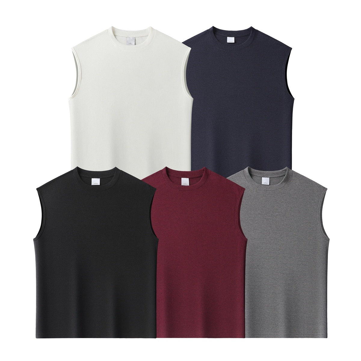 Five sleeveless crew-neck tops shown from the front in ivory, navy, black, burgundy, and gray.