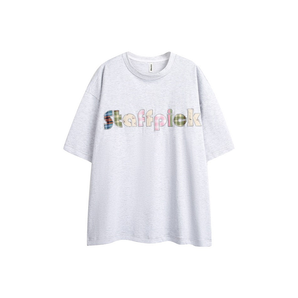 Heather gray short-sleeve crew-neck T-shirt with plaid and floral appliqué letters across the chest, flat front view