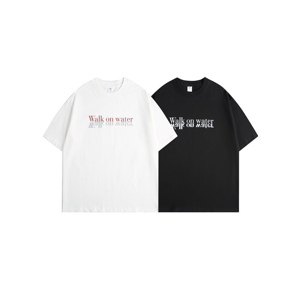 White and black crew-neck T-shirts shown side by side, each with a “Walk on water” chest print.