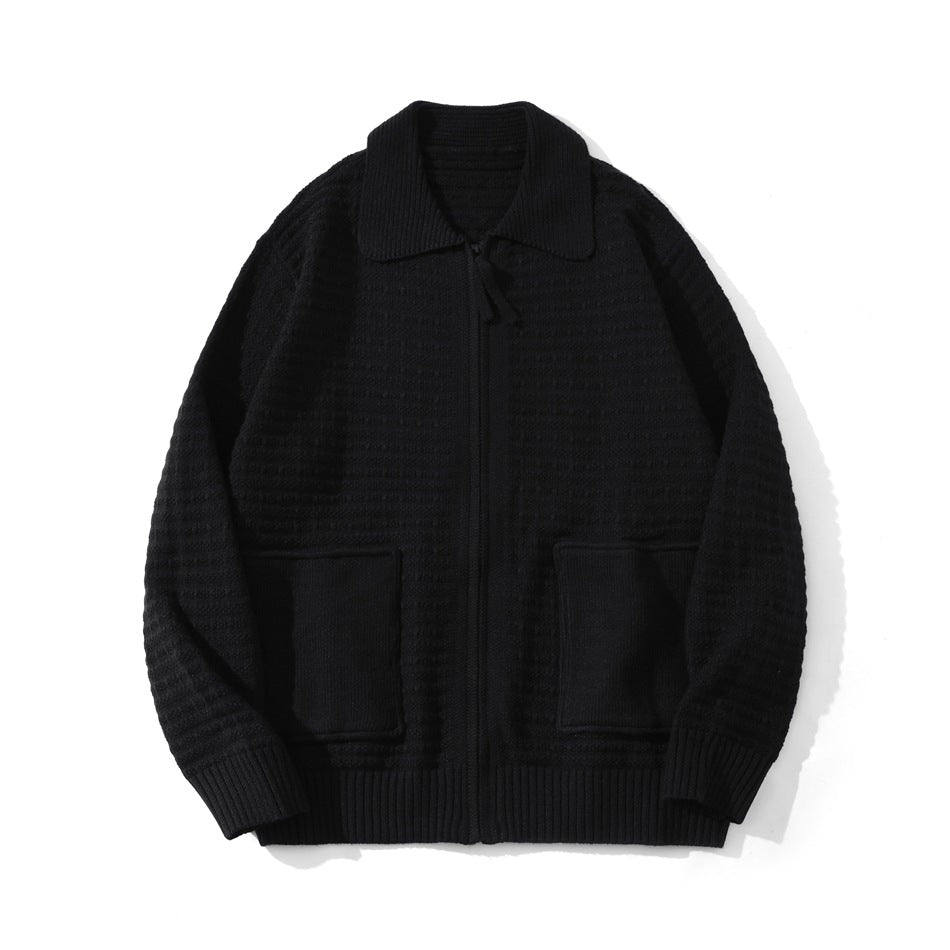 Black textured knit zip-up cardigan with spread collar and two patch pockets, flat lay front view